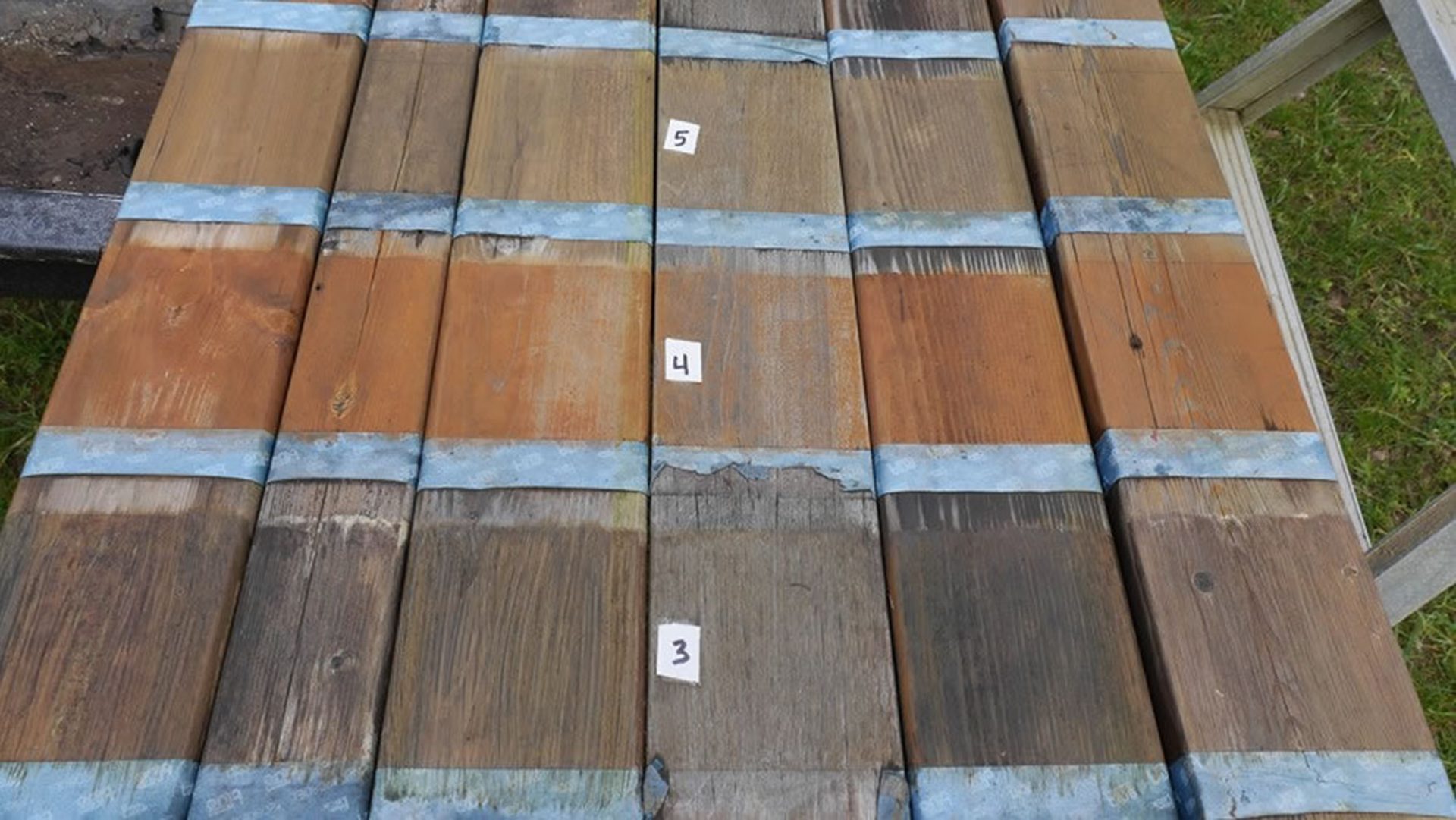 Pallet of stained timber