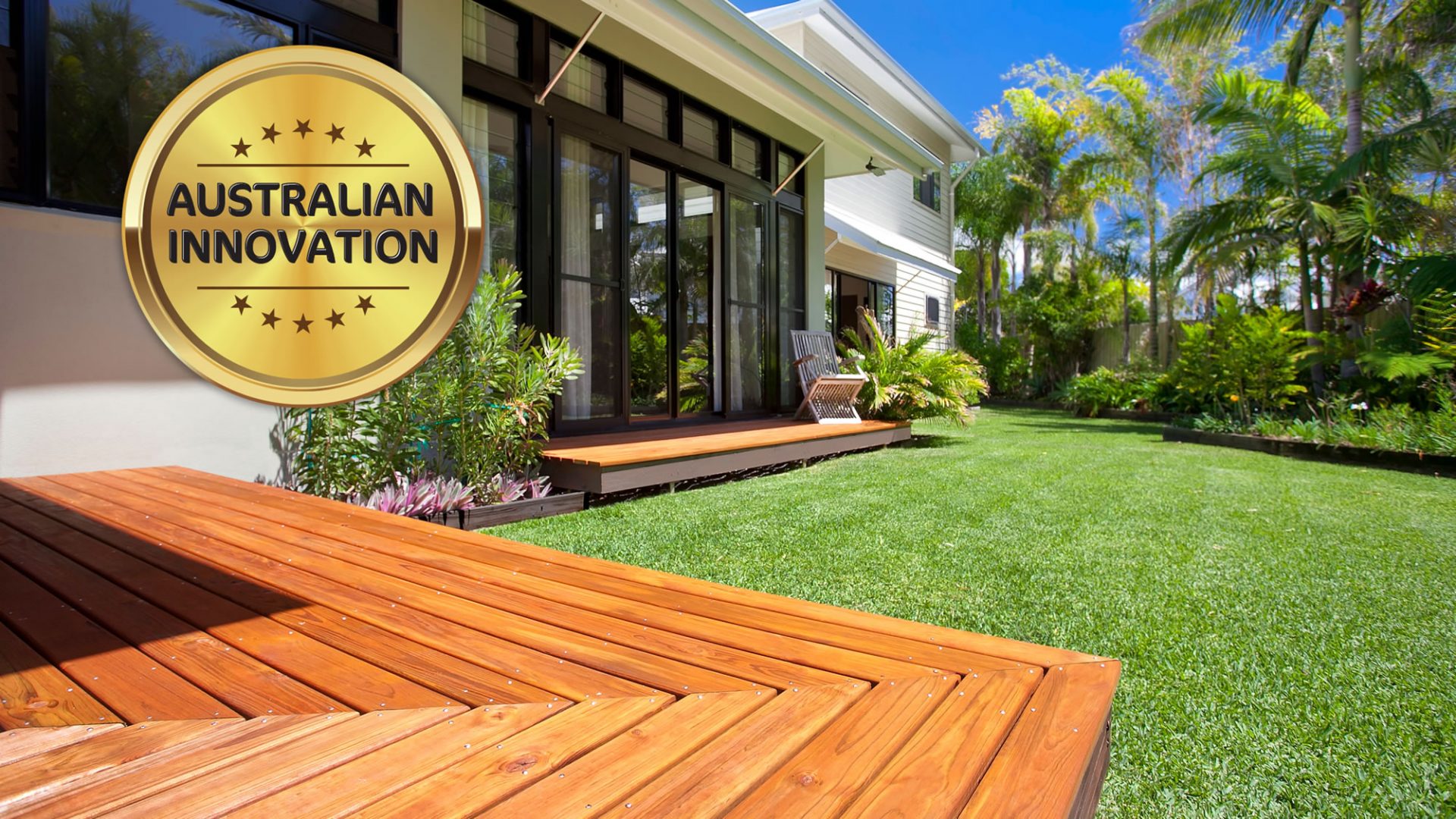 Australian Innovation banner on photo of backyard witn dark timber deck