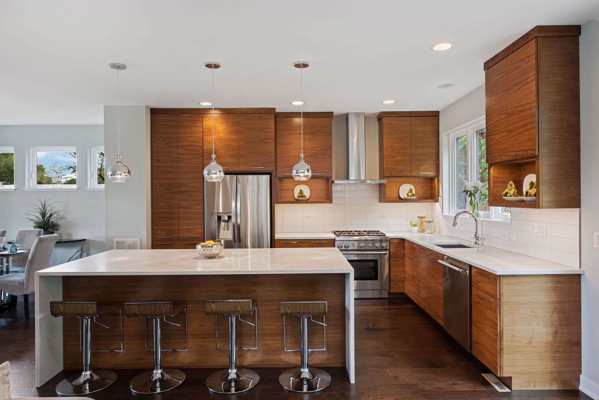 Spacious kitchen with decorative veneer wood panelling